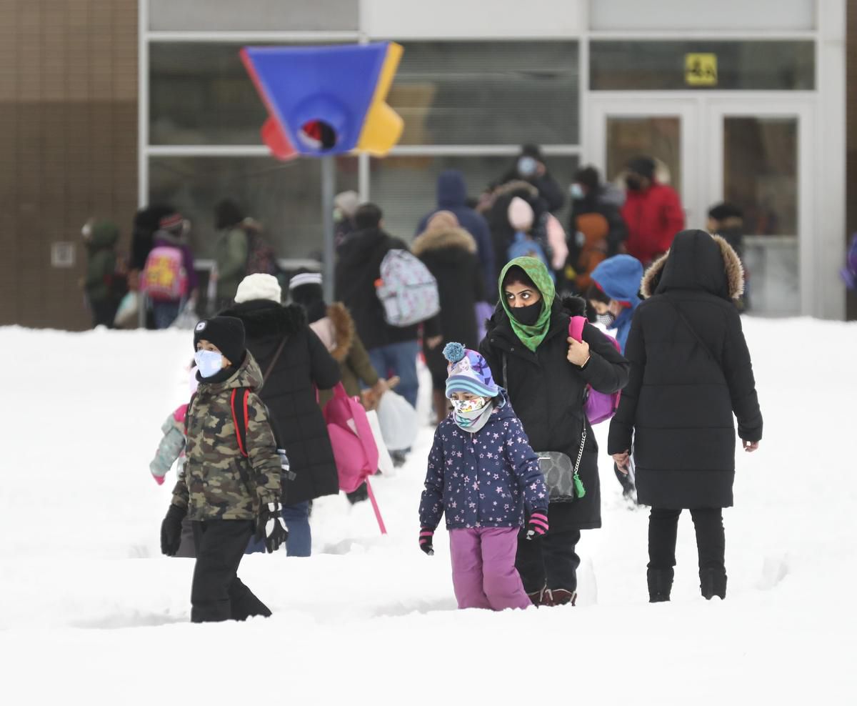 Parents drop off their kids at Thorncliffe Park Public School and the Fraser Mustard Early Learning Academy as in-class learning resumed.
