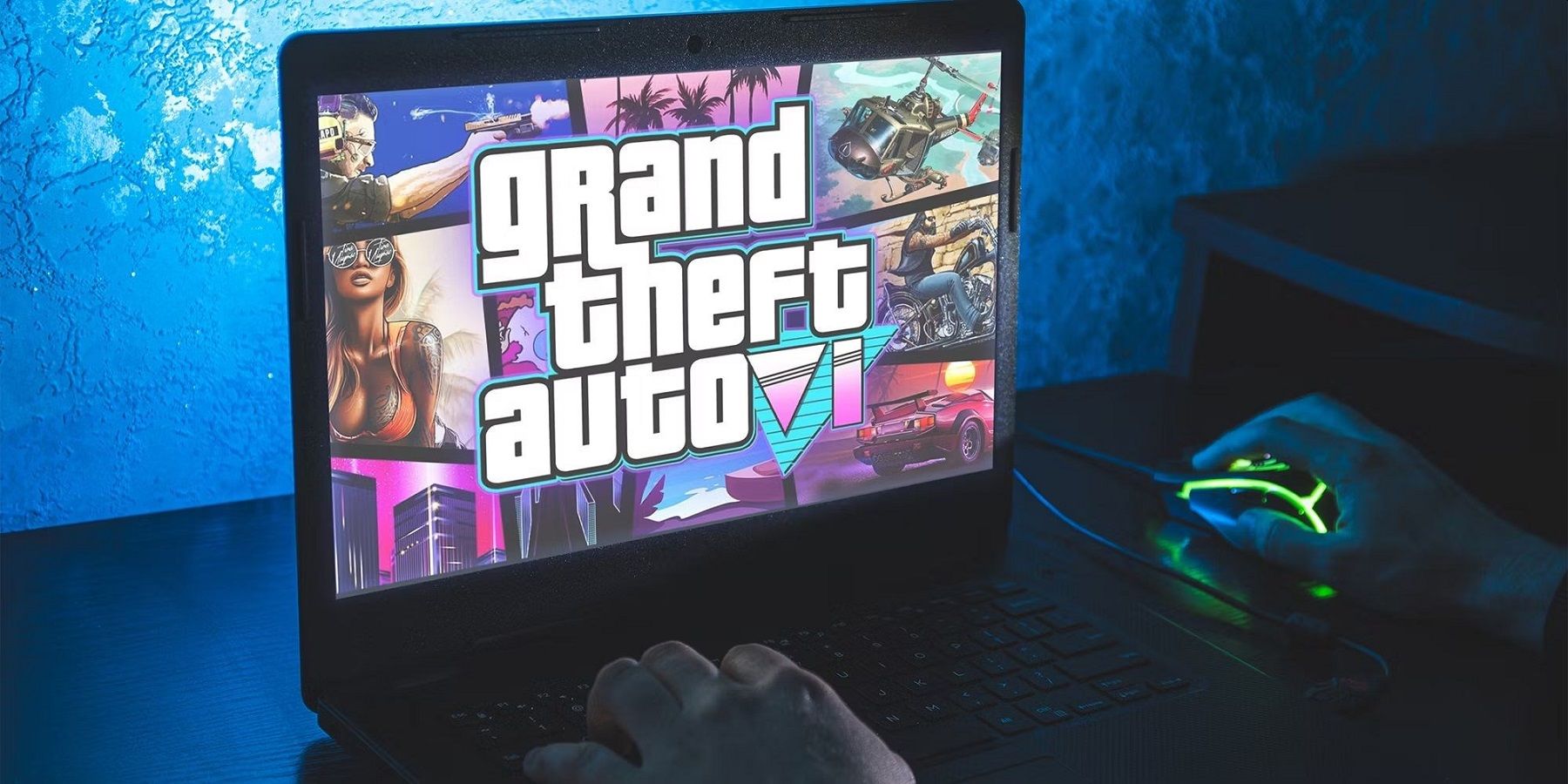 Foto af en bærbar computer med et Grand Theft Auto 6-stilbillede på skærmen.