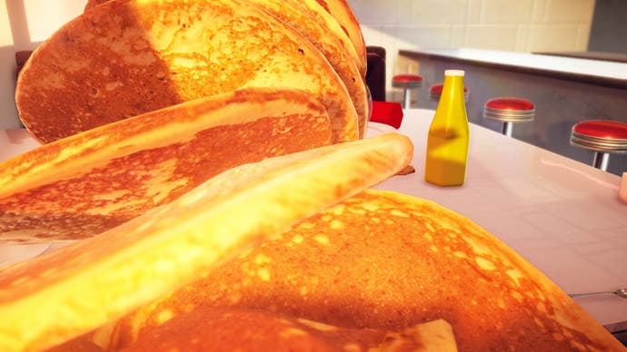 Et skærmbillede fra madspillet Nour, der viser de største pandekager, verden nogensinde har set, stablet op og falder mod kameraet.  Sæt dig ind!