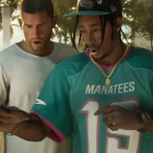 Two GTA 6 characters gasp at a phone screen