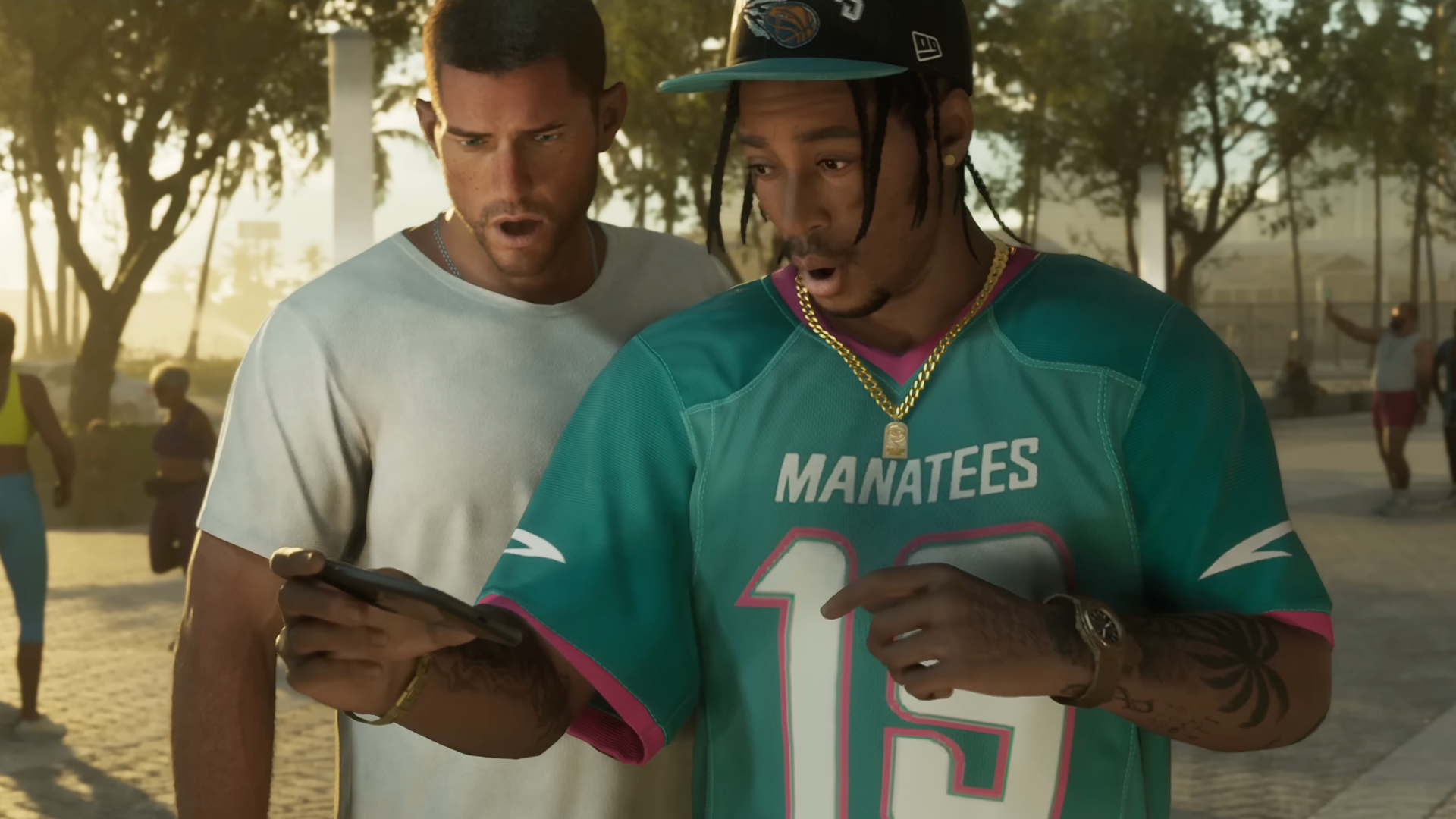 Two GTA 6 characters gasp at a phone screen